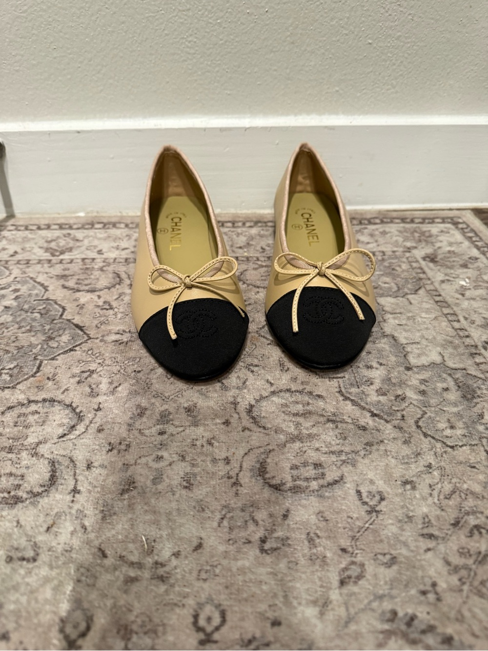 CHANEL Beige Leather Ballet Flats with Black Cap Toe